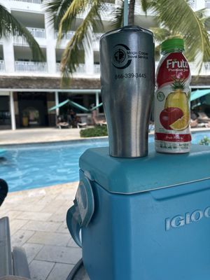 Enjoying some shade and cool beverages by the pool at Sandals Barbados