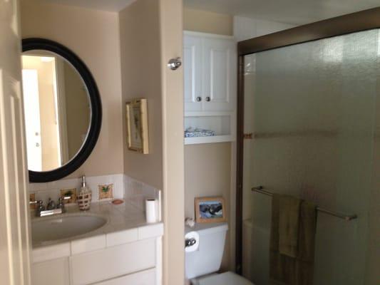 Bathroom with shower stall in rental 105