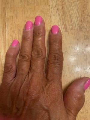 Manicure with gaps at base of nail. Polish wasn't applied close enough to the cuticle.