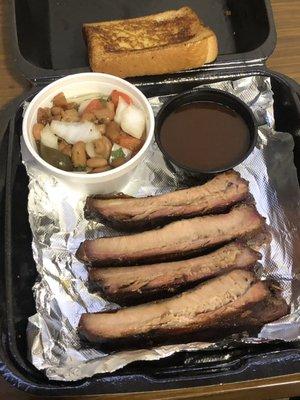 4 rib plate with bread, spicy sauce, double serving of ranch house beans (second serving not shown) - Delicious !!!