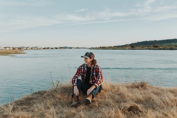 Senior boy by the water