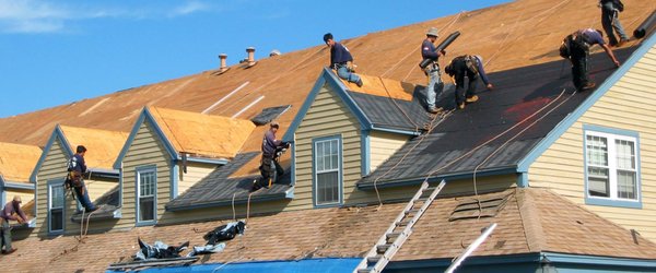 GoTech Roofing Team Installing New Roof