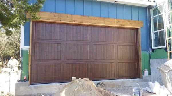 New wood garage doors.