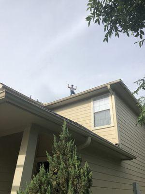 John on the roof to do his job!