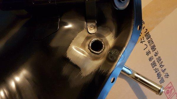 Inside of the oil pan. Tight spot, but manageable