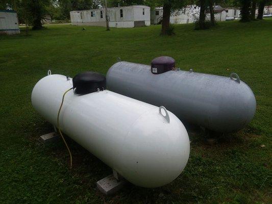 This is a picture showing my Hood's propane tank setting next to my neighbor's MFA Oil propane tank as set up by the trailer park.