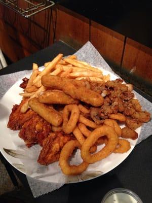 Appetizer sampler. Fried goodness. Cheese sticks and wings were surprisingly very good.