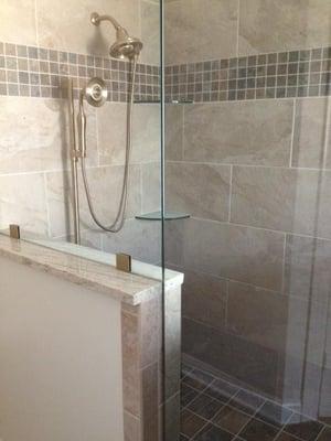 This is a photo of a custom electronic shower. It was once a simple ceramic shower with a traditional valve.