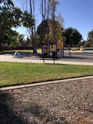 Children's play area, grass, walkways