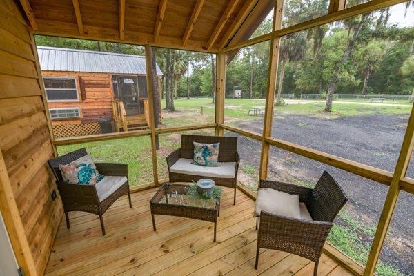 Screened in porch on every cabin.