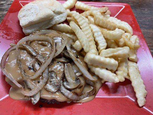 Hamburger steak in gravy with onions and mushrooms