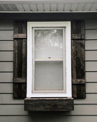 Completed window shutters and flower box