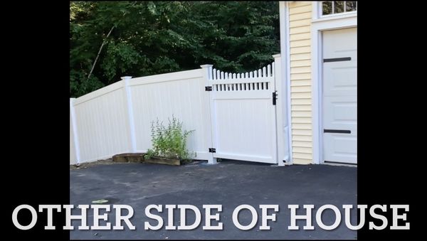 New privacy fence and decorative gate installed on the other side of our house where no fence existed previously