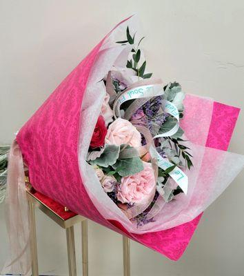 Shershe la fam flower bouquet available on our website.