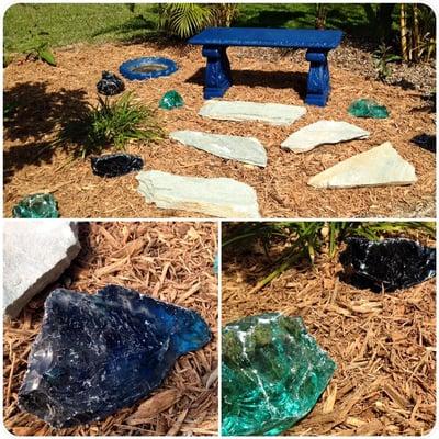 Decorative, tumbled glass is the perfect accent to your lawn or garden