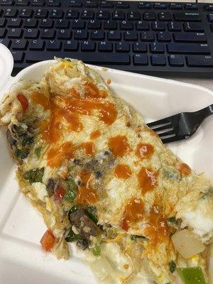 Veggie egg white omelette with hot sauce