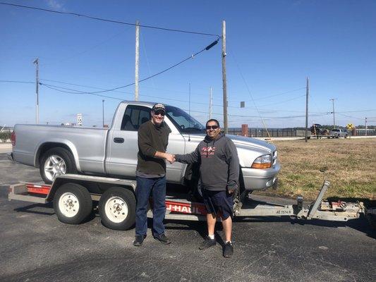 Thanks Select Auto Sales! My husband smile over his new "toy" says it all!