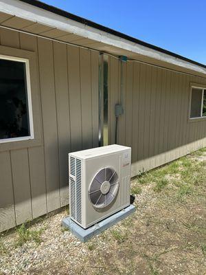 Mitsubishi 2 ton condenser installed with a pad base