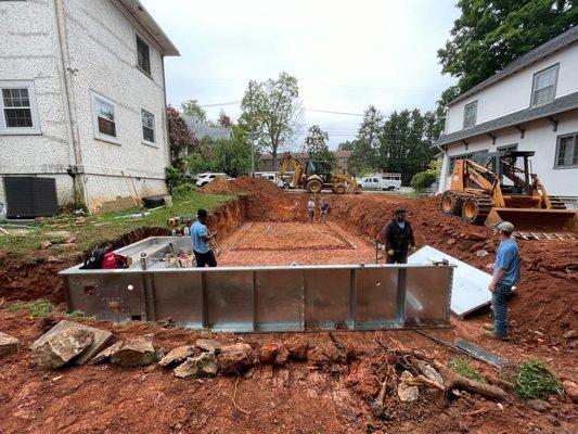 Framing an in-ground swimming pool.