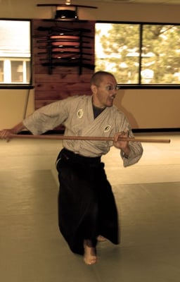 Instructors from all over the world visit to teach at the Jinenkan Dojo. Here Mario DeMol from Belgium is teaches Jojutsu.