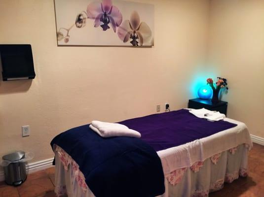 Comfortable Massage Rooms, with cell phone chargers provided to allow your phone to recharge while you recharge.