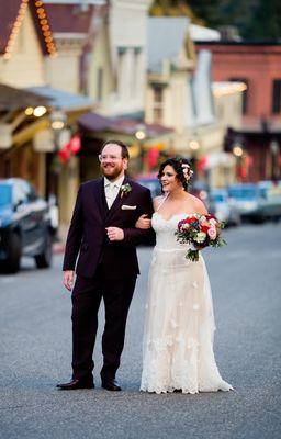 Standing tall as they celebrate their first moments as a married couple in Nevada City.