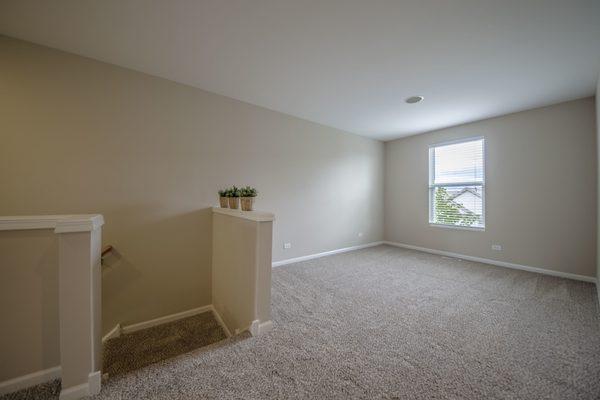 The loft was made cozy and inviting with this plush twist carpet.