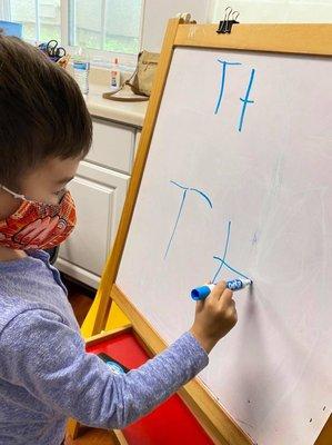 Phonics & fine motor skills- learning to write and recognize the letters and sounds.