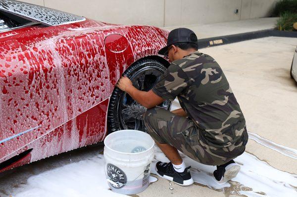 Me getting to the detail of cleaning deep inside the wheels