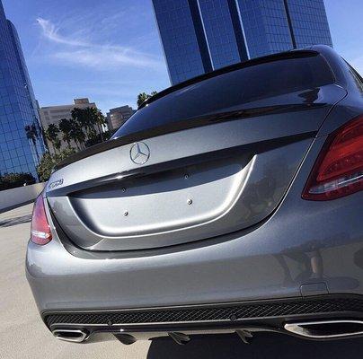 Got my lip and chrome trunk bar wrapped in gloss black