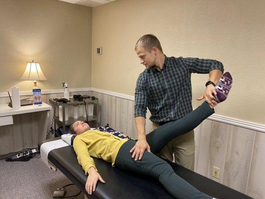 Dr. Anderson checking the function of the psoas muscle. A very important low back muscle and driver of pain.