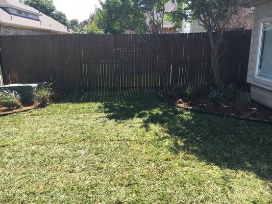 We installed St. Agustin grass , New flower bed edging , and seasonal plants.