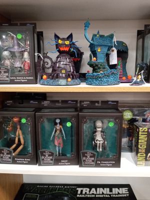 Nightmare before Christmas figures and Hawthorne Village black light series buildings