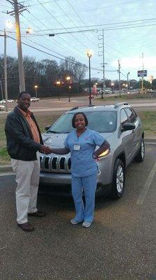 Rodger with Mrs. Lasheba Fitzgerald in her new Jeep!!