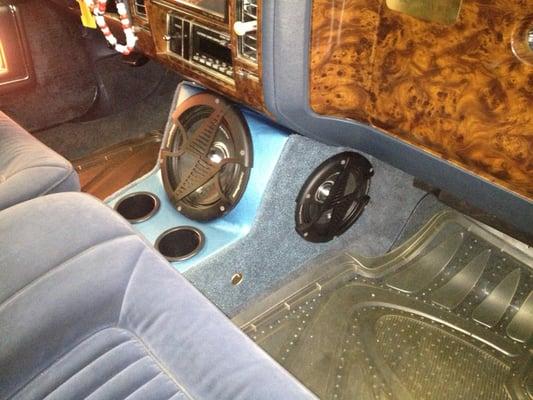 79' Cadillac custom center console with cup holders.