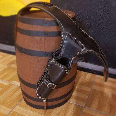 Leather holsters for your guns.