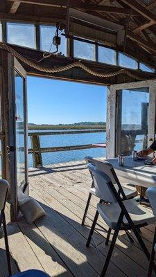 Looking out from the gathering space to the dock and the water.