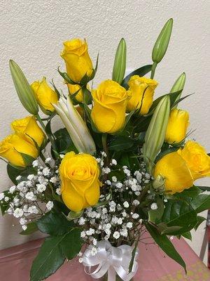 Yellow roses with lilies