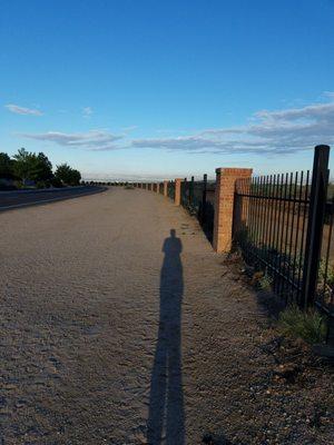 My shadow and i going on a 3-mile walk at The Academy