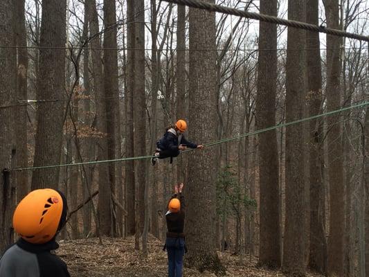 Zip lining as part of the team building workshop for the middle school class