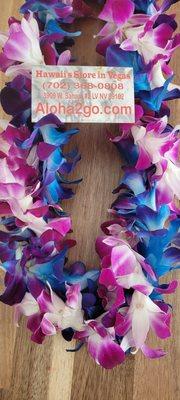 Double sprayed blue and purple orchid leis