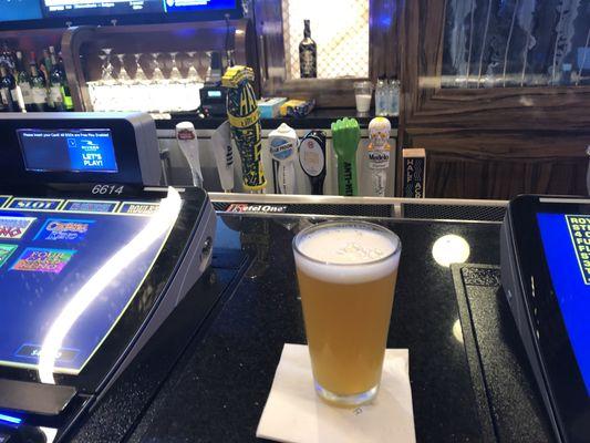 A delectable beer of the month in Aug 2023, a Sierra Nevada hazy IPA for $5.  Other draft taps in background.