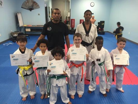 Awarded certificate and belts for passing there test