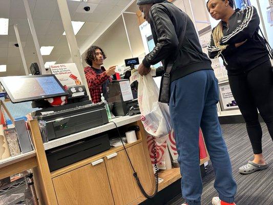 The red plaid shirt is the Racist target employee i was discussing in my review