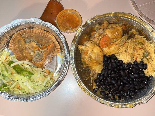 Beef empanadas and stewed chicken with yellow rice and black beans