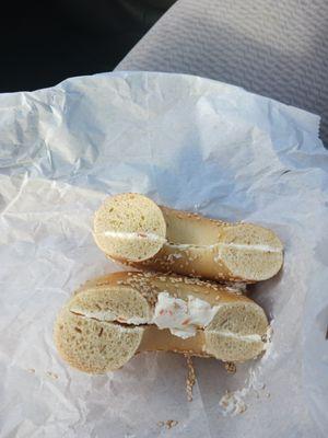 The smallest amount of cream cheese I've ever seen on a bagel.