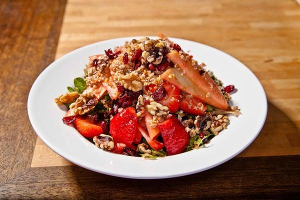 Artisan lettuce, sun dried cranberries, bulgur, apple, and strawberries tossed in raspberry vinaigrette and sprinkled with goat cheese.