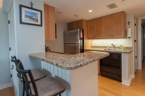 Kitchen Bar, Refrigerator, Sink, and Dishwasher