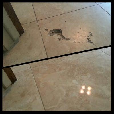 Travertine floor fully repaired without the need of replacement.