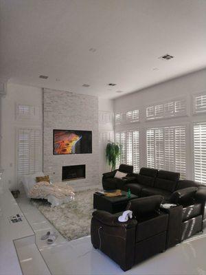 Living room LED recessed lighting and Surround Sound system.